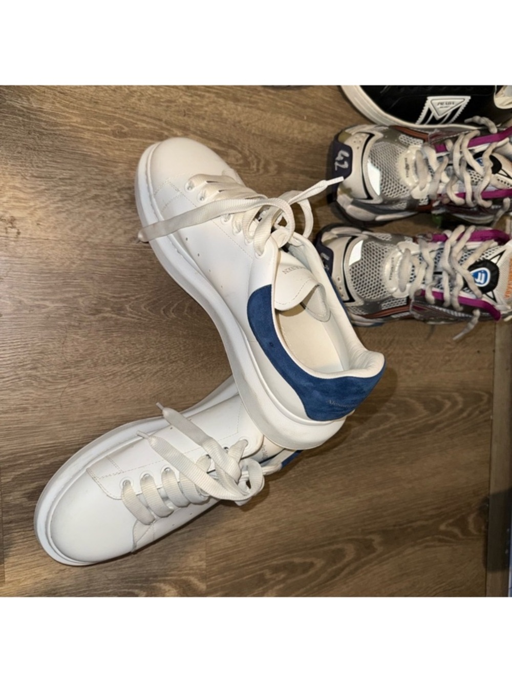 White Sneakers with Blue Heel Accent